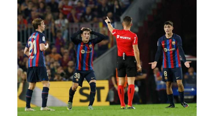Barcelona charged with corruption in referee affair
