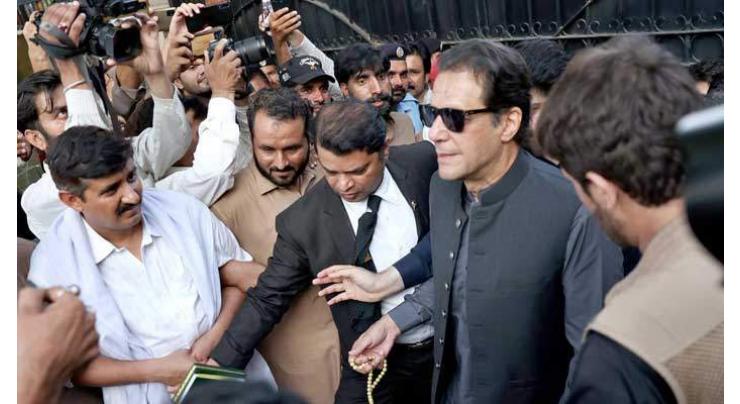 Court suspends Imran Khan's arrest warrants in judge threatening case
