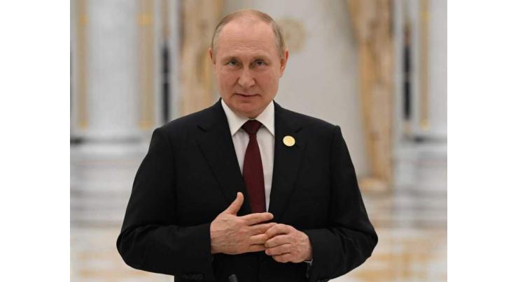 Putin visits Crimea on annexation anniversary
