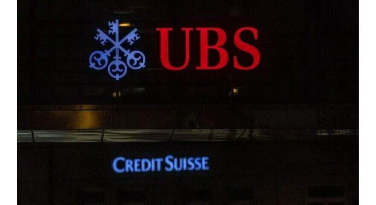 UBS takes over Credit Suisse in move to calm the markets
