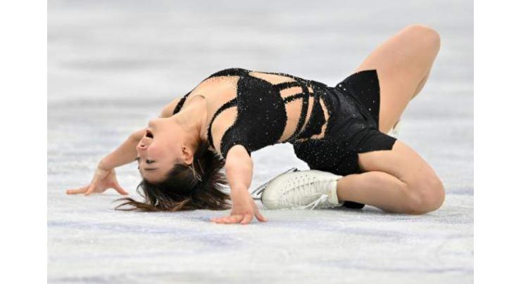 Sakamoto hits high notes to lead at skating worlds
