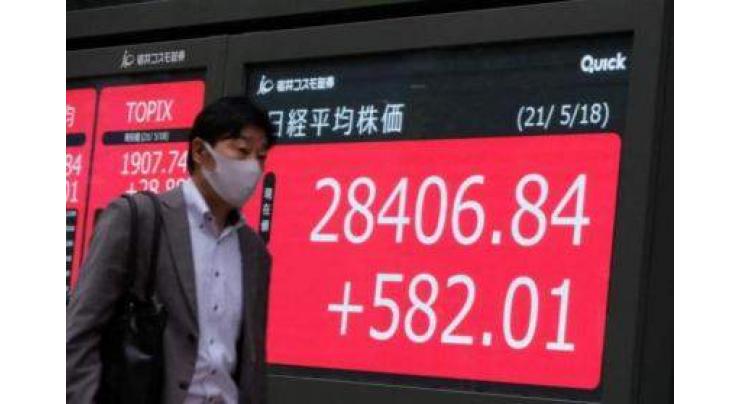 Tokyo stocks open lower after Fed rate hike
