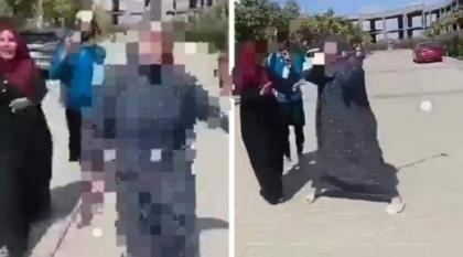 شاھد : امرأة مصریة تعتدي علی شخص قائلة ” أنت جاي تخبط علی باب بیتي “