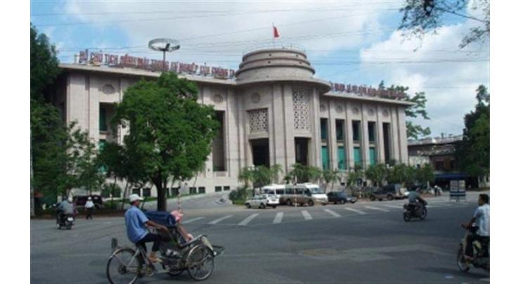 Vietnam's central bank to cut refinance rate, lower cap on deposit rates

