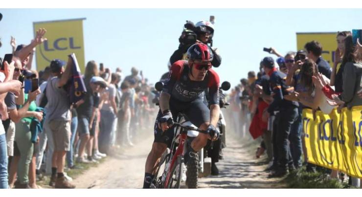 Cobbles and crashes as outsider Jackson wins Paris-Roubaix classic
