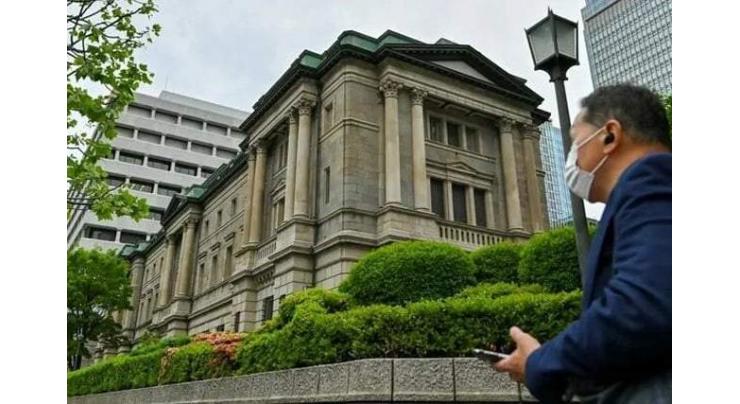 Bank of Japan maintains monetary easing but plans review
