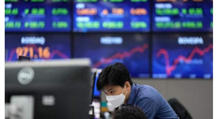 Asian markets slip as traders left unmoved by US inflation data
