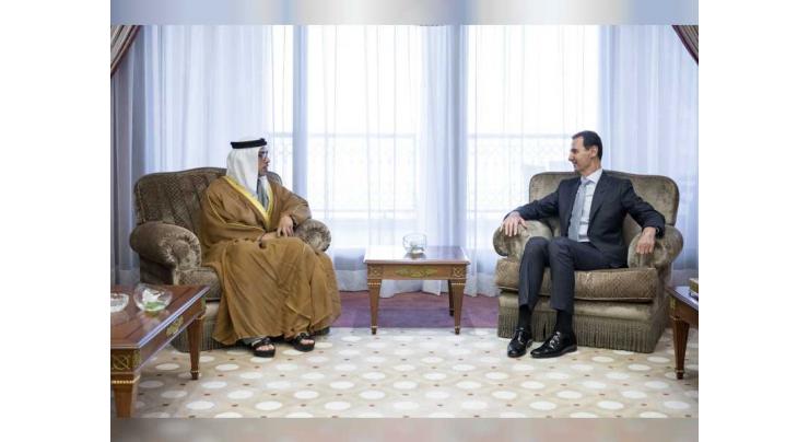 Mansour bin Zayed meets with Syrian President