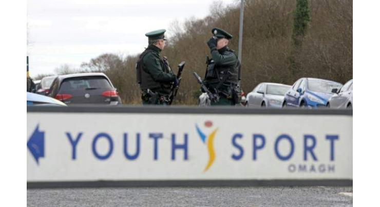 Seven charged with N.Ireland police shooting appear in court
