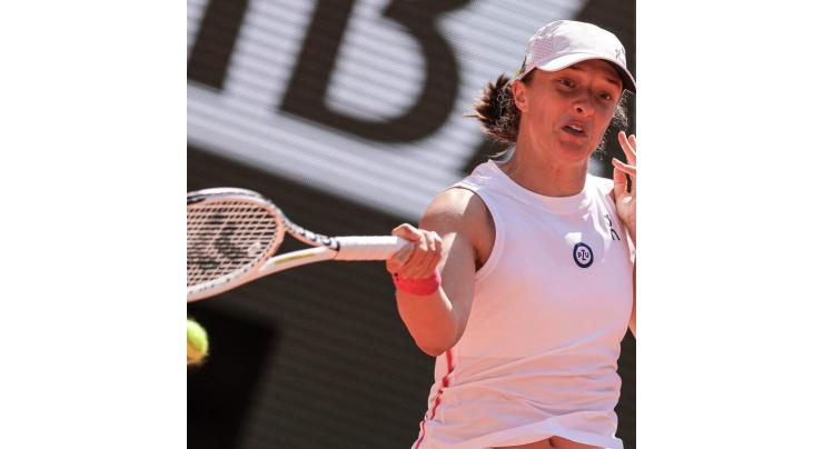 Swiatek thrashes Wang 6-0, 6-0 in 51 minutes to reach French Open last 16
