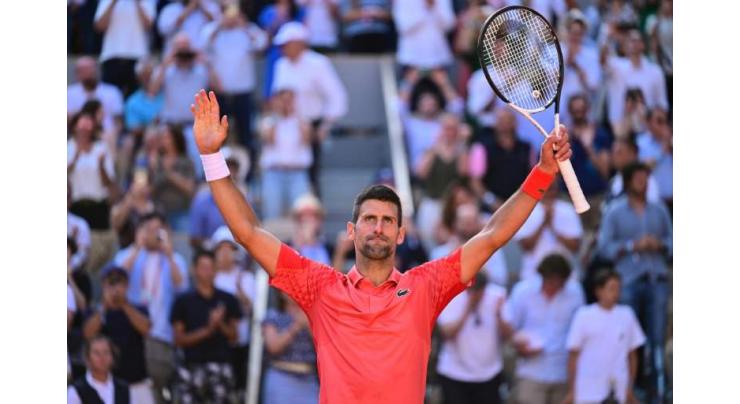 Djokovic into French Open semi-finals for 12th time

