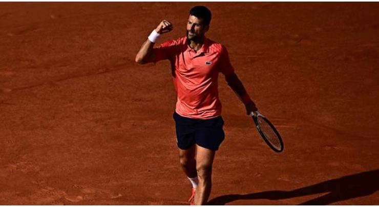 Djokovic into seventh French Open final as Alcaraz hit by injury
