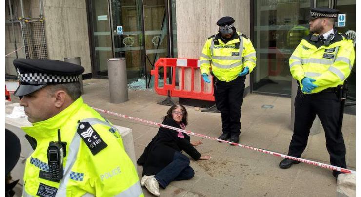 London Police Arrest 4 Climate Activists for Throwing Paint Over Office Building