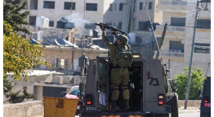 Israeli forces kill two Palestinian gunmen in West Bank raid
