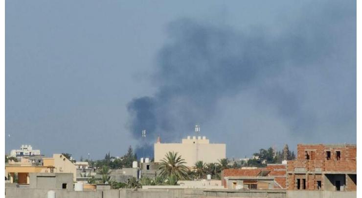 Clashes in Libya capital kill two and shut airport
