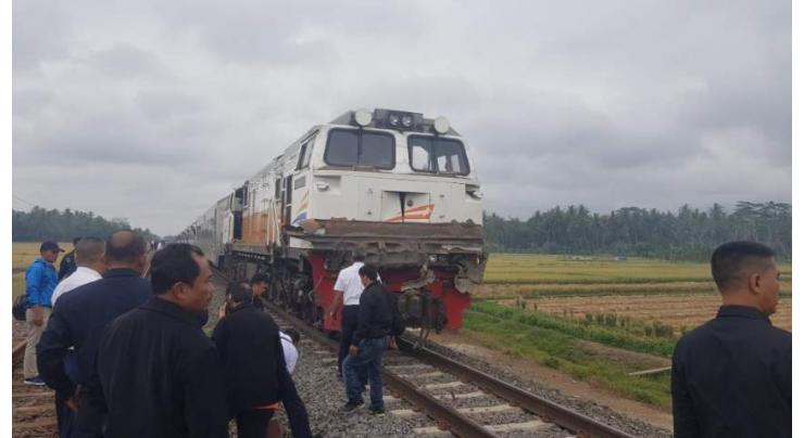 2 killed in train-car collision in Indonesia's North Sumatra

