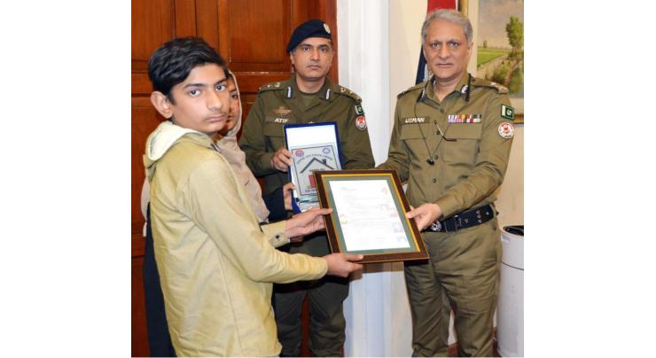 IGP distributes ownership documents of plots to families of police martyrs

