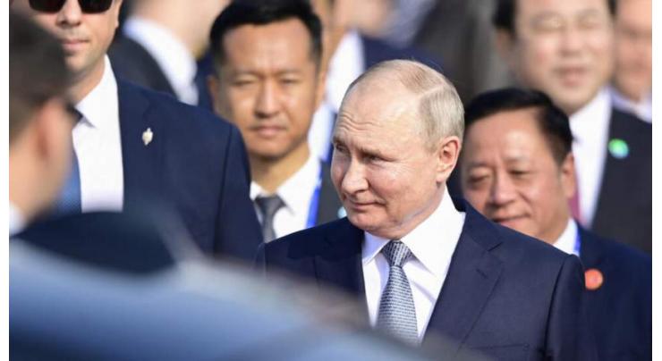 Xi welcomes 'dear friend' Putin to Beijing