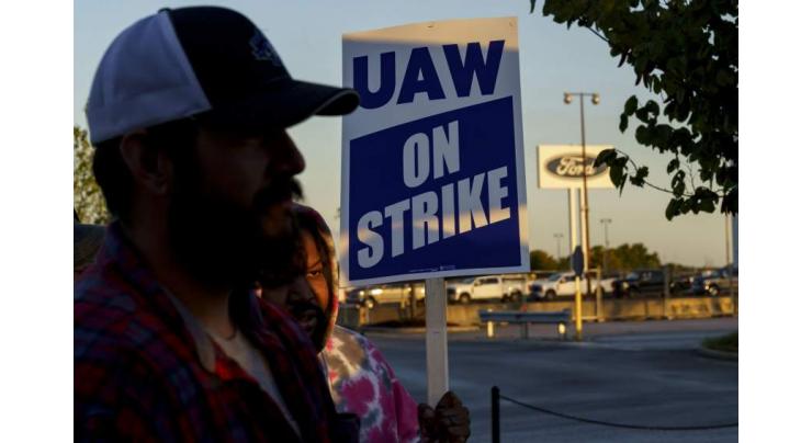 US auto union expands strike after GM profits top estimates