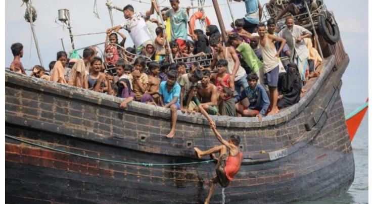 About 250 Rohingya refugees reach Indonesia's west on decrepit boat