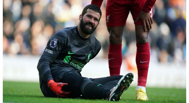 Liverpool's Alisson and Jota face spell on sidelines