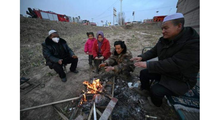 'Too dangerous inside': China quake victims set in for freezing night