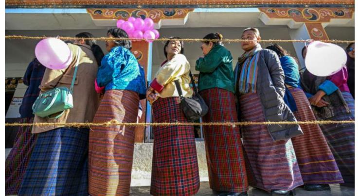 Bhutan votes as economic strife hits 'national happiness'