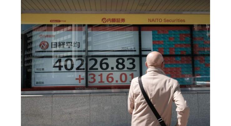 Asian stocks rise on US gains ahead of key China policy meeting