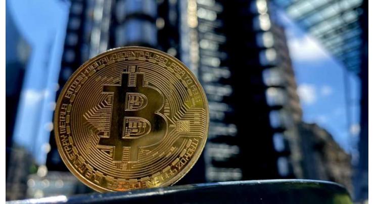 Stocks slip before inflation report, as bitcoin hits fresh record