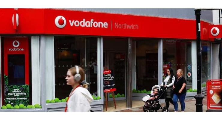 Vodafone sells Italian unit to Swisscom, deal angers Swiss hard-right