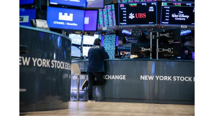 Wall Street stocks lifted by tech rebound before key rate decisions