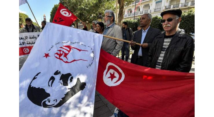 Tunisian court condemns four to death for 2013 killing of politician
