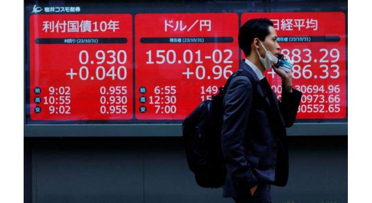 Tokyo shares close lower as US rate cut hopes wane