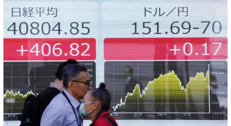 Tokyo stocks close higher