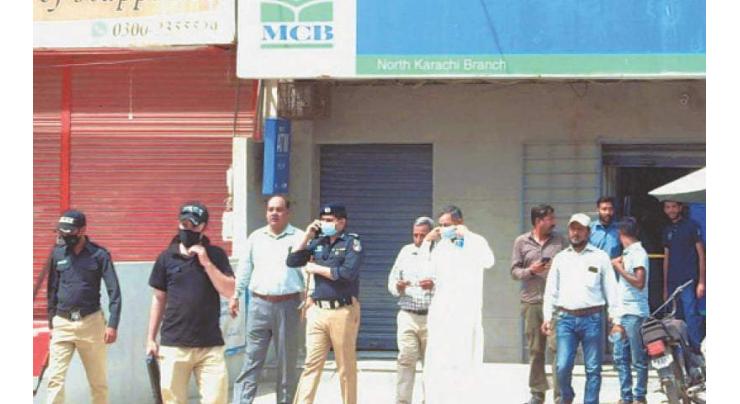Bank employees deprived of Rs 1m at gunpoint