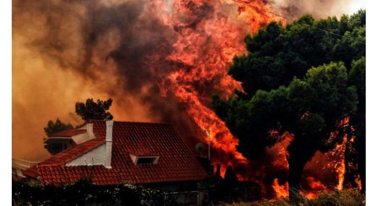 Six convicted amid fury over wildfires that killed 104 at Greek resort