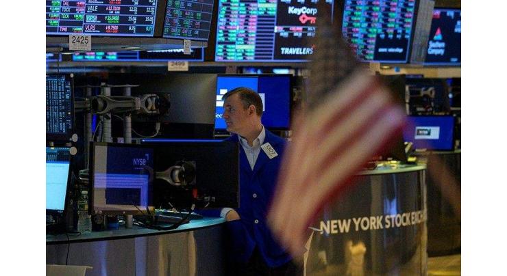 Stock markets set records, dollar slides as US inflation cools