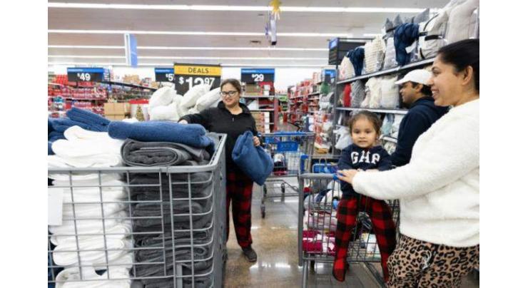 Walmart profits rise on strong sales from wealthier shoppers