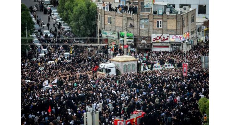 Big crowds in Iran capital for president's funeral