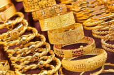 Gold prices go down by Rs2,300 per tola in Pakista ..