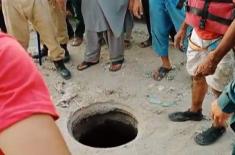 Father, son died after falling into manhole in Ahm ..