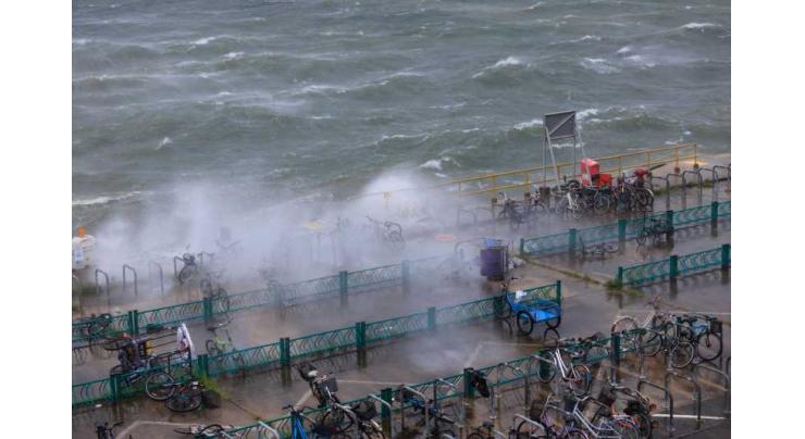 Hong Kong cancels tropical cyclone alarms as typhoon Wipha leaves