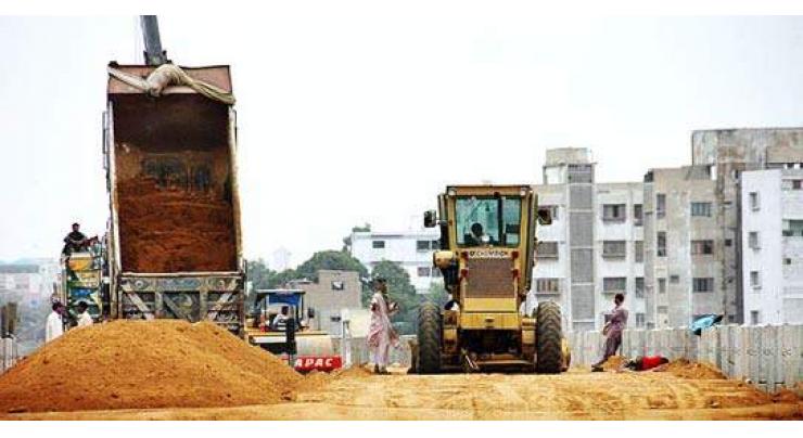 DC reviews progress on development schemes