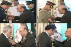 President Zardari confers top civil and military a ..