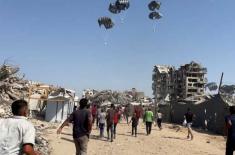 UAE carries out 72nd airdrop of aid over Gaza Stri ..