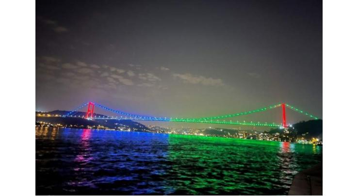 AJK bridges decorated with colorful lights, national flags