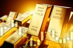 Gold rises slightly, heads for weekly gains