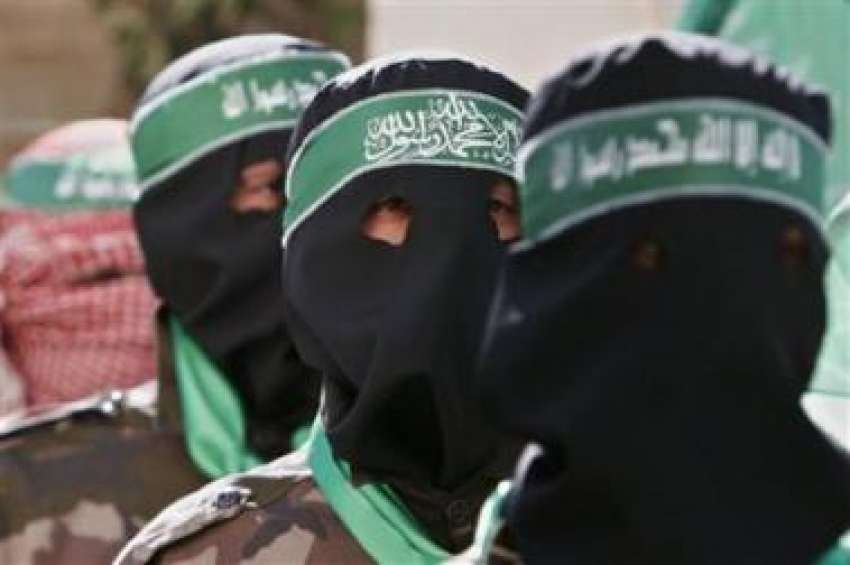 حماس کے نقاب پوش کارکن الفتح  کیخلاف احتجاجی ریلی میں‌شریک ..