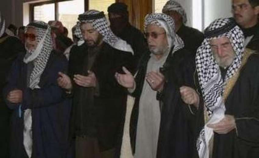 عوجہ،سابق عراقی صدر صدام حسین کی نماز جنازہ ادا کی جا رہی ..
