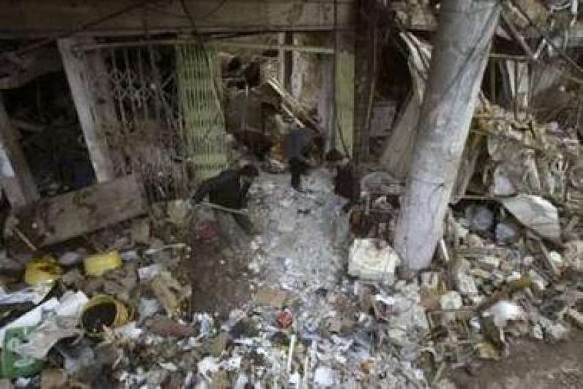 بغداد،خود کش حملے میں تباہ ہونے والی مارکیٹ کی تباہی کا ..